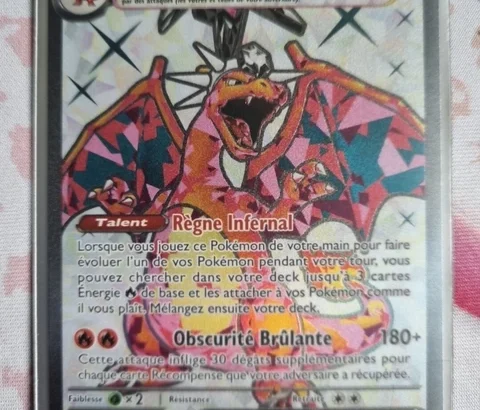 découvrez dracaufeu or flammes obsidiennes, une version exclusive et puissante de ce pokémon emblématique. explorez ses capacités uniques et son style enflammé pour dominer vos combats !